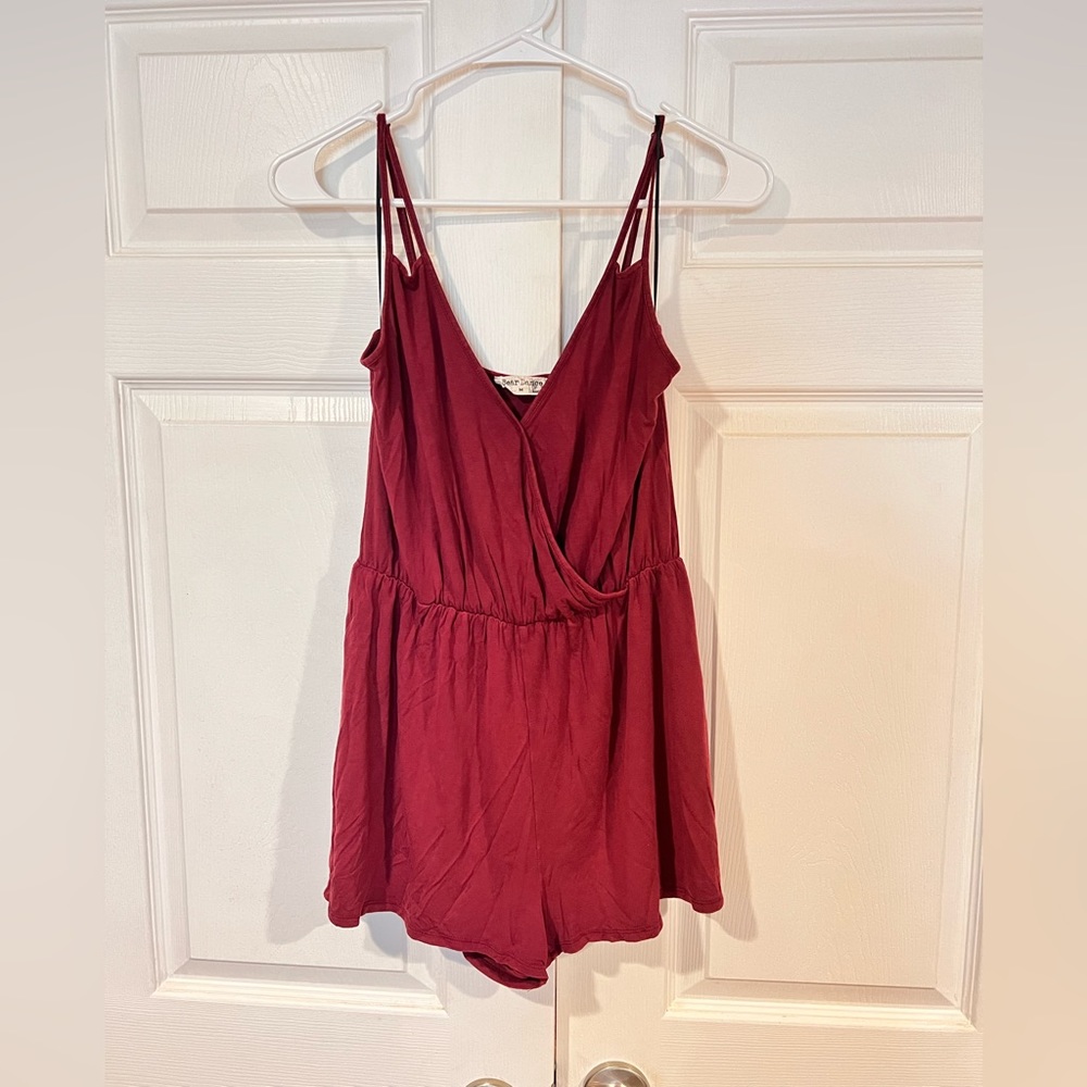 Red romper. Size M.